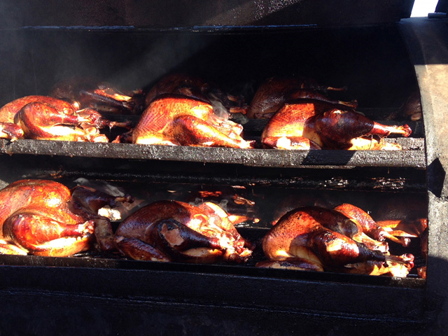 Two rows of turkeys on the grill